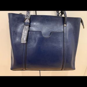 Handbag with shoulder strap